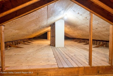 Perched on a commanding 4.5-acre hilltop, this magnificent brick