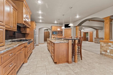 Well-maintained no-step home on a wooded cul-de-sac lot with