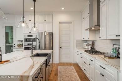 Welcome to a truly spectacular home nestled within the exclusive - photo 15