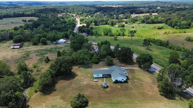 Experience peaceful country living on this beautifully