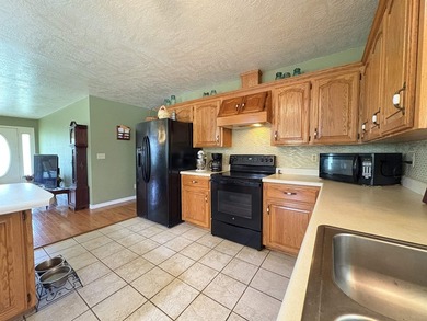 Experience peaceful country living on this beautifully