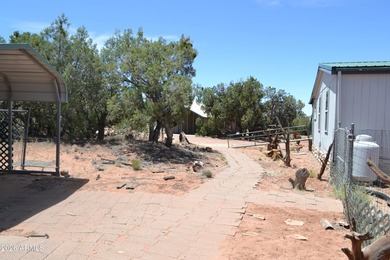Enjoy country living on 4 fully fenced acres with plenty of room - photo 18