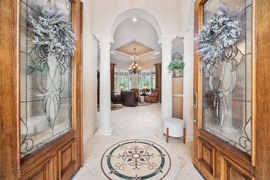 Welcome to this stunning custom-built home located in the - photo 2