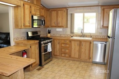 Move-in ready and full of charm! This well-maintained 2 bed, 2 - photo 9