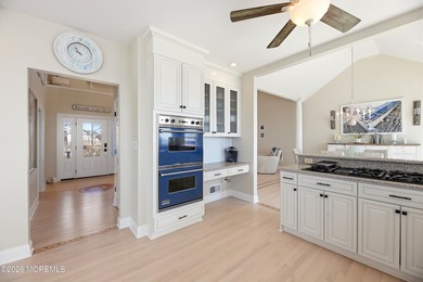 Introducing a premier waterfront residence where the setting is - photo 12