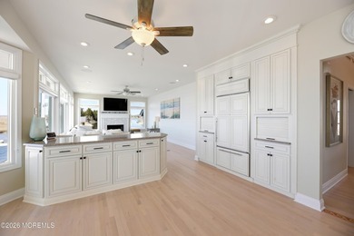 Introducing a premier waterfront residence where the setting is - photo 13