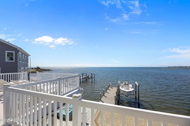Introducing a premier waterfront residence where the setting is - photo 29