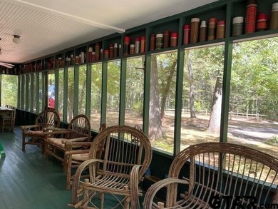 NESTLED AMONG TREES IS YOUR PRIVATE PARADISE FOR THIS NOSTALGIC - photo 3