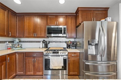 Welcome to your dream home nestled in the Town of Greece! This - photo 12