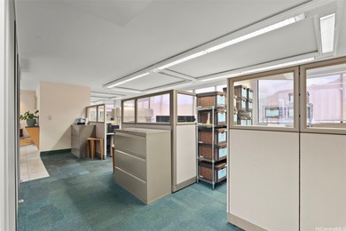 Space is currently configured as a large office with reception