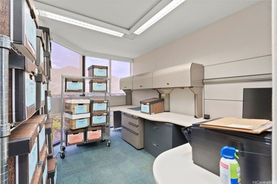 Space is currently configured as a large office with reception