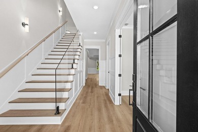 Don't miss this exceptional new construction home in the highly - photo 3