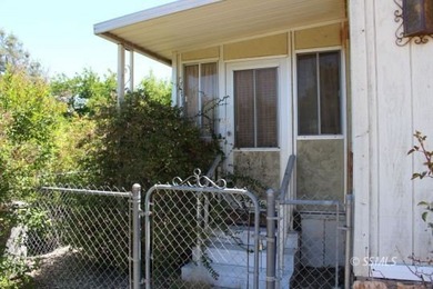 This is a 1969 Villa West manufactured home, 2 bedrooms, 1.5 - photo 2