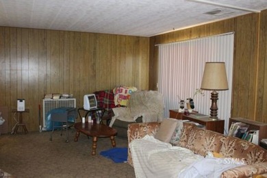 This is a 1969 Villa West manufactured home, 2 bedrooms, 1.5 - photo 4