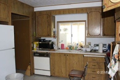This is a 1969 Villa West manufactured home, 2 bedrooms, 1.5 - photo 5