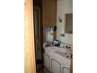 This is a 1969 Villa West manufactured home, 2 bedrooms, 1.5 - photo 8