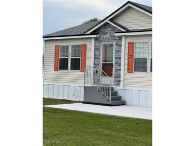 Lake Home For Sale in Moore Haven, Florida