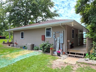 Nestled along the shores of beautiful Lake Francis, this - photo 3