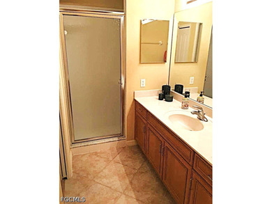 GROUND FLOOR, TURNKEY CONDO is a GREAT BUY. Tile on diagonal in - photo 14