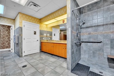 GROUND FLOOR, TURNKEY CONDO is a GREAT BUY. Tile on diagonal in - photo 22