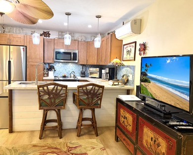 Discover true toes-in-the-sand paradise at Kihei Kai Unit 18 - a - photo 6