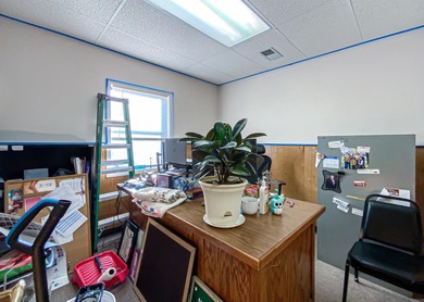 Commercial building in the heart of town. This all-brick