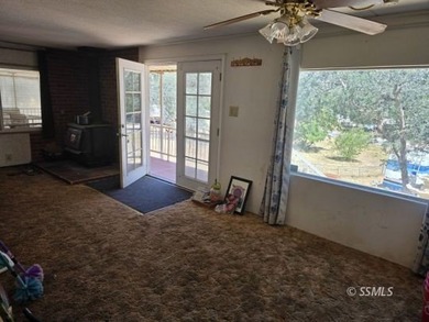 Perched on the high point of the parcel, this manufactured home - photo 5