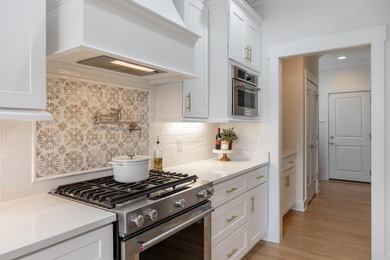 This thoughtfully designed home blends Southern charm with - photo 12