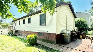 Lovely And Well-Maintained Raised Ranch Set on 67 x 161 Property - photo 17