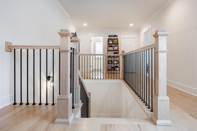 This thoughtfully designed home blends Southern charm with - photo 26