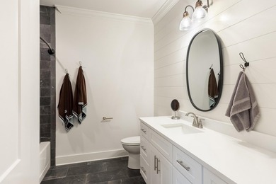 This thoughtfully designed home blends Southern charm with - photo 29