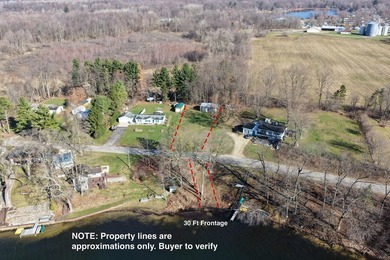 This .4 acre buildable lot includes 30 feet of lake frontage on - photo 12