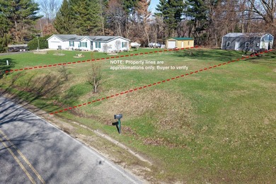 This .4 acre buildable lot includes 30 feet of lake frontage on - photo 13
