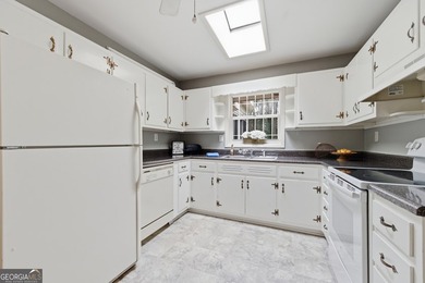 Well maintained 2 bedroom, 1.5 bath ranch featuring hardwood