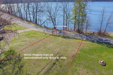 This .4 acre buildable lot includes 30 feet of lake frontage on - photo 14