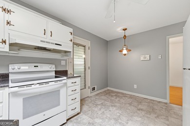 Well maintained 2 bedroom, 1.5 bath ranch featuring hardwood