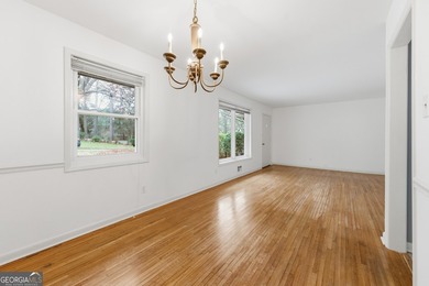 Well maintained 2 bedroom, 1.5 bath ranch featuring hardwood