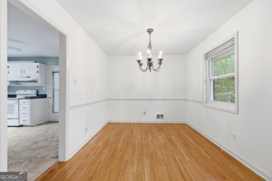 Well maintained 2 bedroom, 1.5 bath ranch featuring hardwood