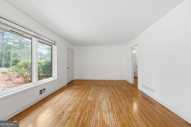 Well maintained 2 bedroom, 1.5 bath ranch featuring hardwood