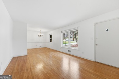 Well maintained 2 bedroom, 1.5 bath ranch featuring hardwood