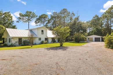 Nestled on a private one-acre homesite overlooking the tranquil - photo 1
