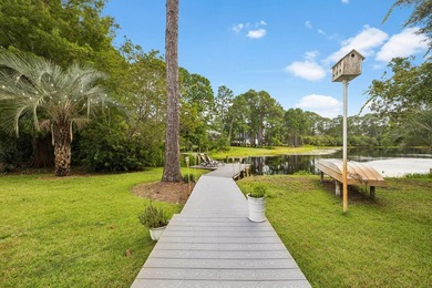 Nestled on a private one-acre homesite overlooking the tranquil - photo 3