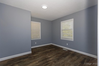 2 bedroom 1 bath brick home with a view of the Spring river - photo 11