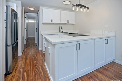 Discover this beautifully-remodeled high-floor unit in the - photo 2