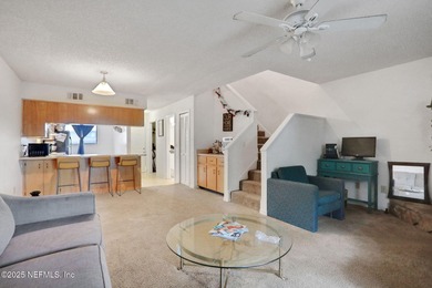 Take a look at this charming 2-bedroom, 2.5-bath townhouse - photo 2