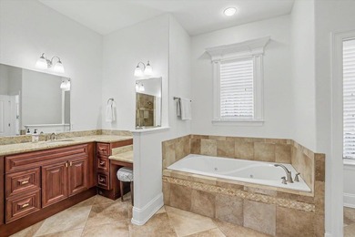 Gorgeous custom home located on the SouthWood Golf Course! This - photo 32