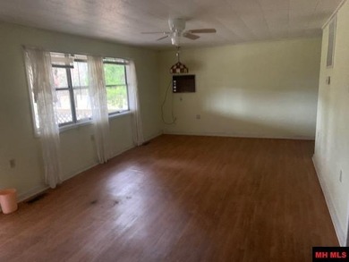 Great buy on a 2,000 sq ft home (3 bdrm/2 bath) fronting scenic