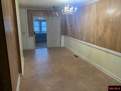 Great buy on a 2,000 sq ft home (3 bdrm/2 bath) fronting scenic