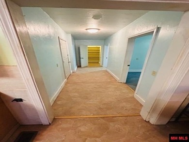 Great buy on a 2,000 sq ft home (3 bdrm/2 bath) fronting scenic