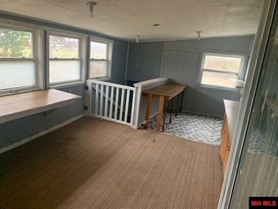 Great buy on a 2,000 sq ft home (3 bdrm/2 bath) fronting scenic